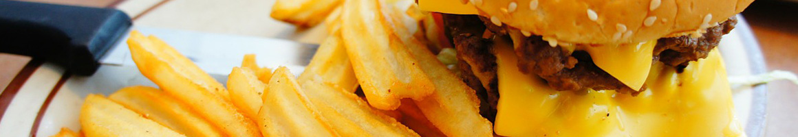 Eating American (Traditional) Burger at Boston Burger Company - Boylston St restaurant in Boston, MA.